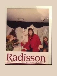 A Polaroid of Alison with Santa at the Radisson Kestrel Hotel on Manly Beach, Sydney.