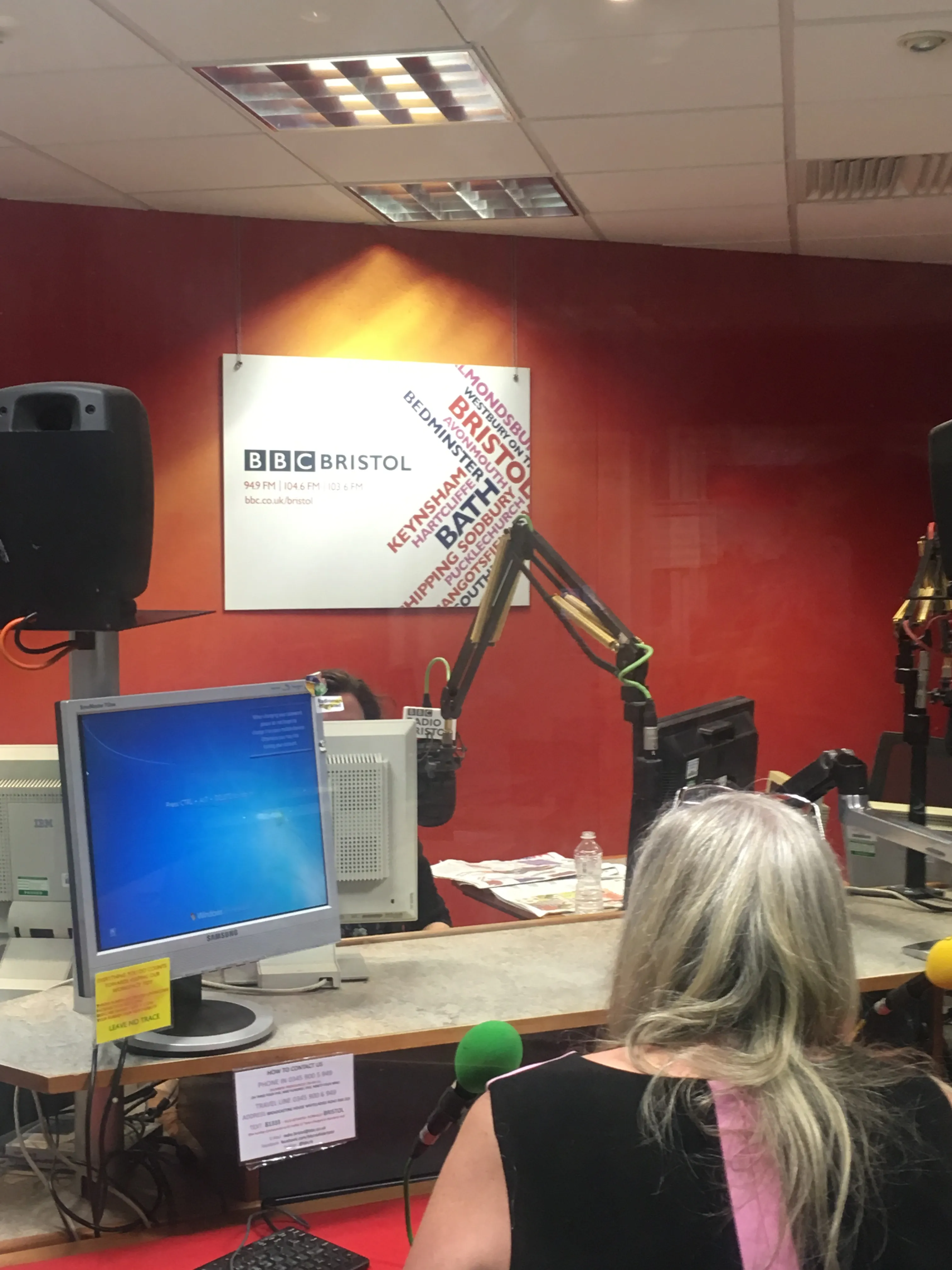 Alison at the microphone in the BBC Radio Bristol studio.