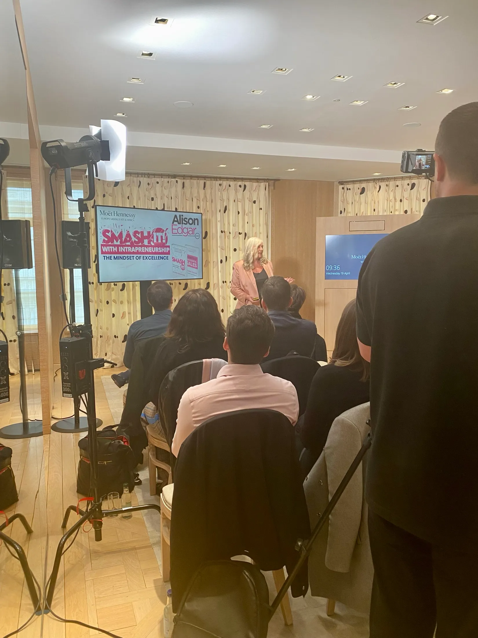 Alison delivering SMASH IT with Intrapreneurship to the room at the Louis Vuitton apartments, cameras rolling for the EMEA broadcast.