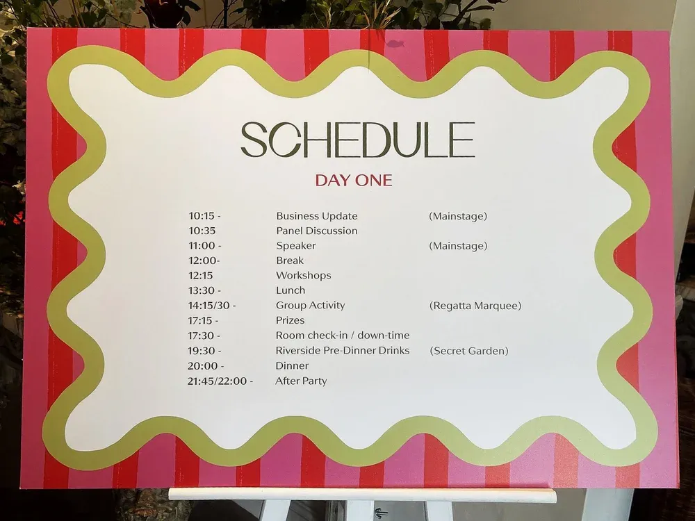 The conference schedule board, with Alison's mainstage speaker slot at eleven.