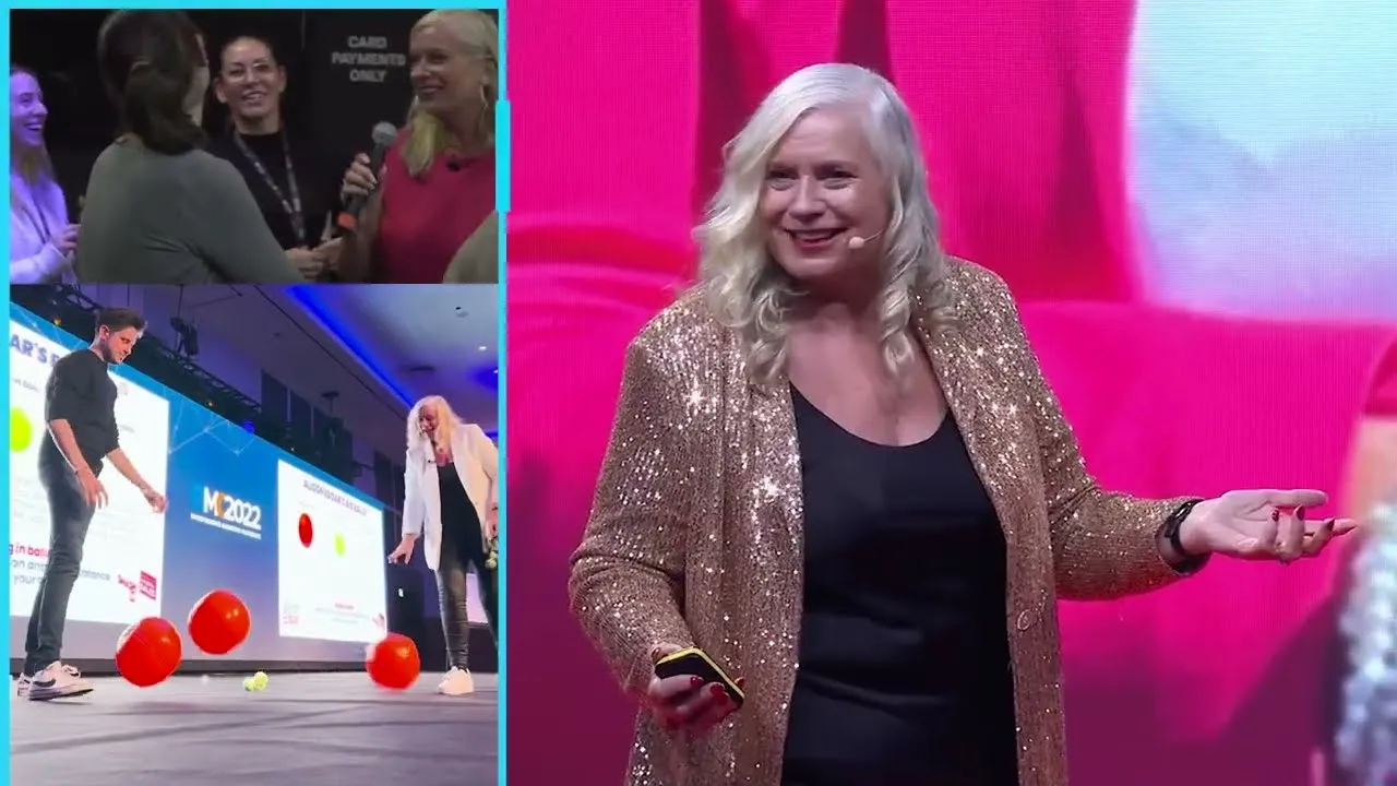 Dr Alison Edgar MBE mid-keynote on stage, from her keynote speaker showreel